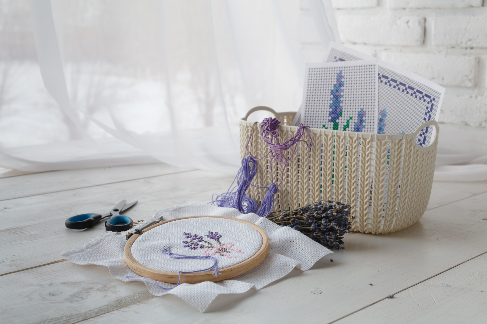 Large editorial photo of embroidered textile on table